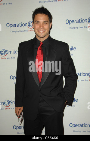 Chris Riggi at arrivals for Operation Smile's 9th Annual Smile Gala, Beverly Hilton Hotel, Beverly Hills, CA September 24, 2010. Photo By: Dee Cercone/Everett Collection Stock Photo