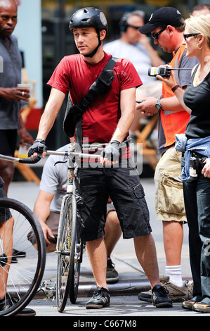 Joseph Gordon-Levitt, rehearses a scene at the 'Premium Rush' movie set in Midtown Manhattan out and about for CELEBRITY CANDIDS - THURSDAY, , New York, NY August 19, 2010. Photo By: Ray Tamarra/Everett Collection Stock Photo