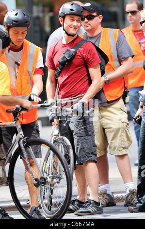 Joseph Gordon-Levitt, rehearses a scene at the 'Premium Rush' movie set in Midtown Manhattan out and about for CELEBRITY CANDIDS - THURSDAY, , New York, NY August 19, 2010. Photo By: Ray Tamarra/Everett Collection Stock Photo