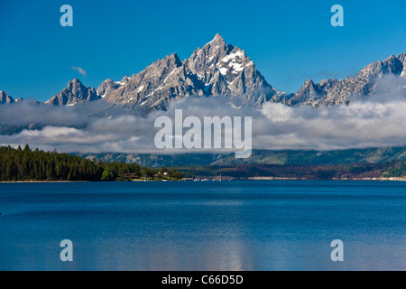 Early morning light on the Grand Tetons Mountain Range and Jackson Lake in the Grand Tetons National Park in Wyoming. Stock Photo