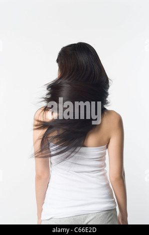 Rear view of woman with long hair Stock Photo - Alamy