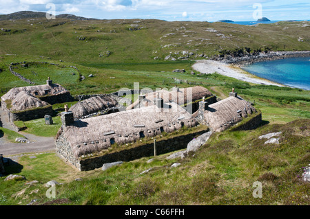 The restored blackhouse village of Na Geàrrannan on the Isle of Lewis in the Outer Hebrides. Stock Photo