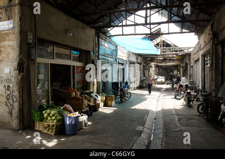 Grocery shop at the corner of Al-e-Aqa street in Bazaare Nayeb Saltane, an old traditional area in downtown Tehran. Stock Photo