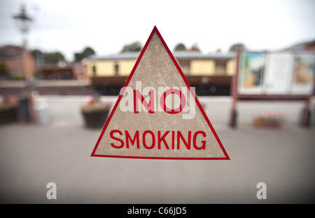 A 'no smoking' sign on the window of an old steam train carriage, Kidderminster, UK. Stock Photo