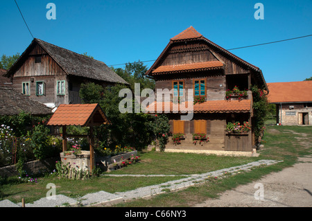 Refurbished wooden house in Cigoc in Lonjsko Polje nature park in Croatia offer now Bed and Breakfast.  Renoviertes Holzhaus. Stock Photo