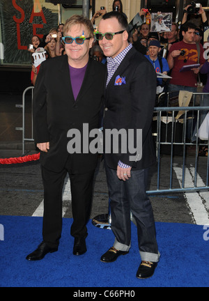 Elton John, David Furnish at arrivals for GNOMEO AND JULIET Premiere, El Capitan Theatre, Los Angeles, CA January 23, 2011. Photo By: Dee Cercone/Everett Collection Stock Photo