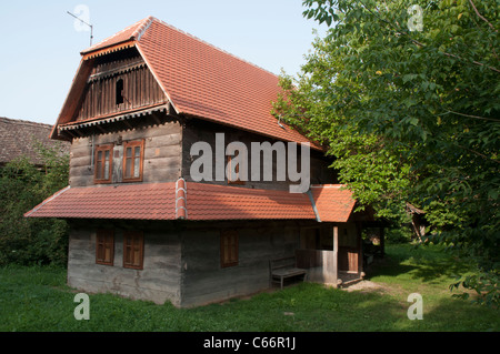 Refurbished wooden house in Cigoc in Lonjsko Polje nature park in Croatia offer now Bed and Breakfast.  Renoviertes Holzhaus. Stock Photo