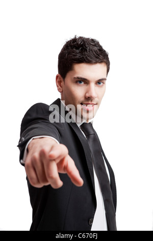 Young businessman pointing to you, isolated over a white background Stock Photo