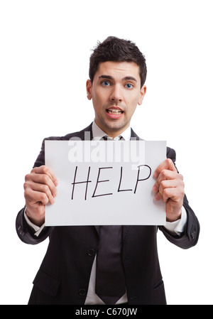 Businessman holding a cardboard with the text Help, isolated on white background Stock Photo