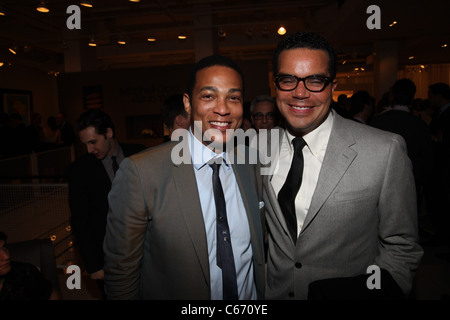Newly out CNN achor, Don Lemon, (left), with guest in attendance for NLGJA's 16th Annual Headlines and Headliners Benefit, Mitchell Gold + Bob Williams SoHo Store, New York, NY March 24, 2011. Photo By: Michael Williams/Everett Collection Stock Photo