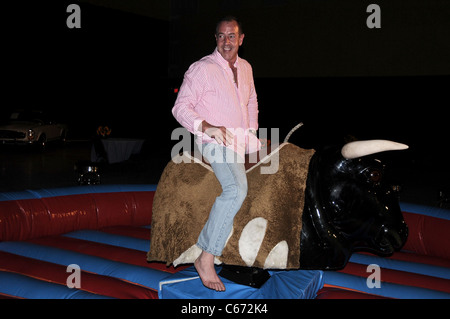 EXCLUSIVE!!! Michael Lohan, riding mechanical bull in attendance for Models Hotel Carnival Benefiting Fashion Delivers, East Hampton Studio, Wainscott, NY June 26, 2010. Photo By: Rob Rich/Everett Collection Stock Photo