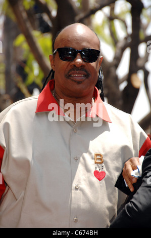 Stevie Wonder at the induction ceremony for Star on the Hollywood Walk of Fame Ceremony for Chaka Khan, Hollywood Boulevard, Los Angeles, CA May 19, 2011. Photo By: Michael Germana/Everett Collection Stock Photo