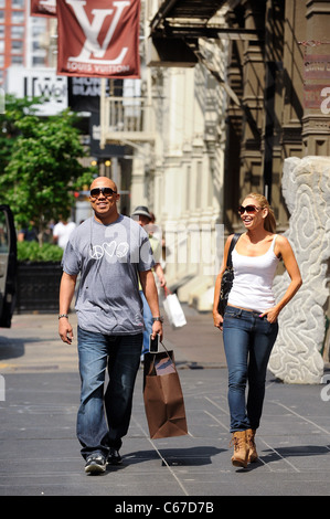 Hines Ward, Kym Johnson, leave the  Louis Vuitton store out and about for CELEBRITY CANDIDS - WED, , New York, NY May 25, 2011. Stock Photo