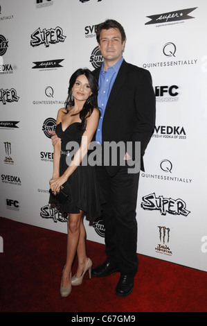 Nathan Fillion, Mikaela Hoover at arrivals for SUPER Premiere, The Egyptian Theatre, Los Angeles, CA March 21, 2011. Photo By: Elizabeth Goodenough/Everett Collection Stock Photo