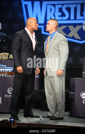 Dwayne The Rock Johnson, John Cena in attendance for WRESTLEMANIA XXVII Press Conference, Hard Rock Cafe, New York, NY March 30, 2011. Photo By: Rob Rich/Everett Collection Stock Photo