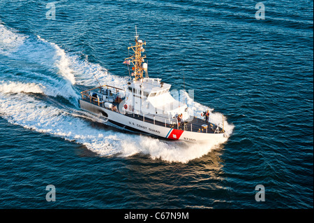 USCGC Petrel - PETREL WPB 87350 USCG Coastal Patrol Boat Coast Guard. San Diego Bay, escorting cruise ship out to sea. Stock Photo