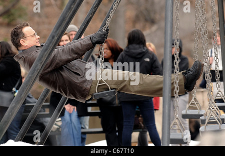 Tom Hanks on location for Filming of EXTREMELY LOUD AND INCREDIBLY CLOSE, Central Park, New York, NY March 22, 2011. Photo By: Kristin Callahan/Everett Collection Stock Photo