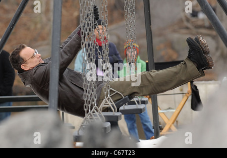 Tom Hanks on location for Filming of EXTREMELY LOUD AND INCREDIBLY CLOSE, Central Park, New York, NY March 22, 2011. Photo By: Kristin Callahan/Everett Collection Stock Photo