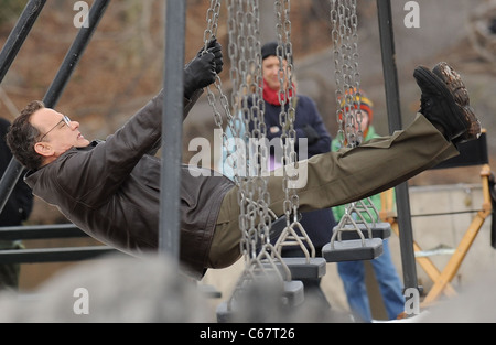 Tom Hanks on location for Filming of EXTREMELY LOUD AND INCREDIBLY CLOSE, Central Park, New York, NY March 22, 2011. Photo By: Kristin Callahan/Everett Collection Stock Photo