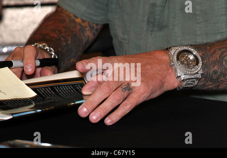 Vince Neil at in-store appearance for Vince Neil TATTOOS & TEQUILA Book Signing, Maryland Parkway Barnes and Noble, Las Vegas, NV September 29, 2010. Photo By: MORA/Everett Collection Stock Photo