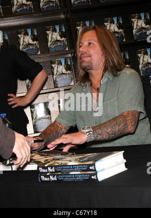 Vince Neil at in-store appearance for Vince Neil TATTOOS & TEQUILA Book Signing, Maryland Parkway Barnes and Noble, Las Vegas, NV September 29, 2010. Photo By: MORA/Everett Collection Stock Photo