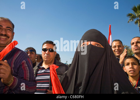 A Muslim woman attends the Day of Victory in Tahrir Square on Feb.18, 2011, one week after the ouster of President Hosni Mubarak Stock Photo