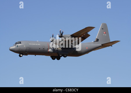 Military aviation. Lockheed Martin C-130J-30 Hercules cargo plane of the Royal Danish Air Force on final approach Stock Photo