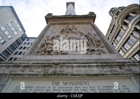 The Monument, erected near Pudding Lane where the Great fire of London in 1666 began, which is now a London tourism attraction Stock Photo