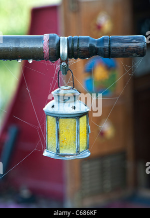 Star Lantern on the tiller of a canal boat Stock Photo