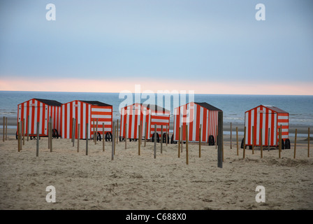 beach with beach huts De Panne Belgium Stock Photo