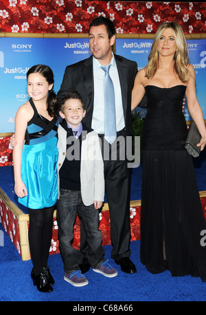 Bailee Madison, Griffin Alexander Gluck, Adam Sandler, Jennifer Aniston at arrivals for JUST GO WITH IT Premiere, The Ziegfeld Theatre, New York, NY February 8, 2011. Photo By: Desiree Navarro/Everett Collection Stock Photo