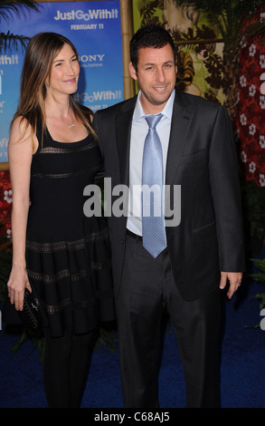 Adam Sandler, wife Jackie at arrivals for JUST GO WITH IT Premiere, The Ziegfeld Theatre, New York, NY February 8, 2011. Photo By: Kristin Callahan/Everett Collection Stock Photo