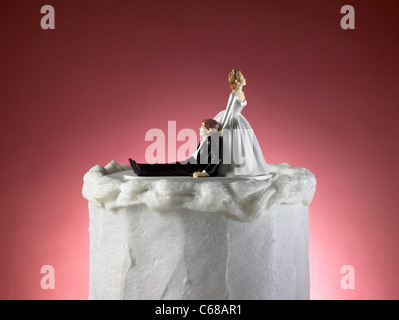Funny Wedding Cake Topper of Bride & Groom Stock Photo