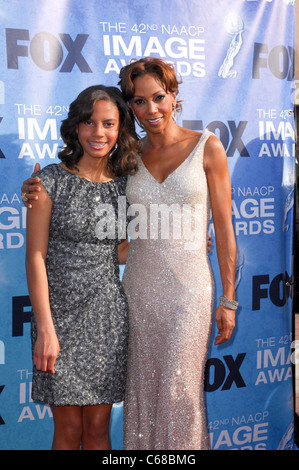 Holly Robinson Peete, daughter Ryan Elizabeth at arrivals for 42nd NAACP Image Awards, Shrine Auditorium, Los Angeles, CA March Stock Photo