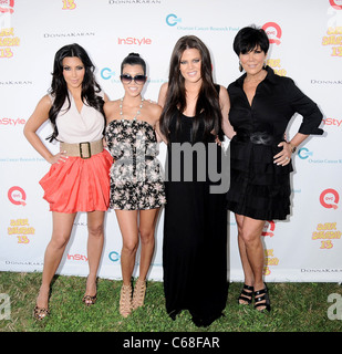 Kim Kardashian, Kourtney Kardashian, Khloe Kardashian, Kris Kardashian in attendance for Super Saturday 13 Benefit for the Ovarian Cancer Research Fund (OCRF), Nova's Ark Project, Water Mill, NY July 31, 2010. Photo By: Rob Rich/Everett Collection Stock Photo