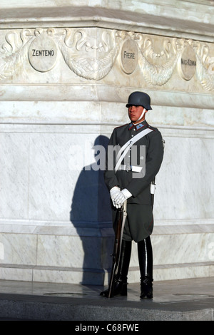 Young soldier stands guard in front of Monumento O'Higgins in the Plaza de Cultura. Stock Photo