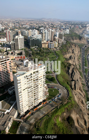 Aerial view of Miraflores and its coastal cliffs bordering the Pacific Ocean. Miraflores, Lima, Peru South America Stock Photo