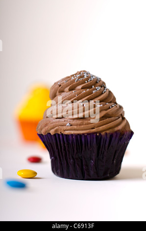 Chocolate cupcake with chocolate-colored Stock Photo