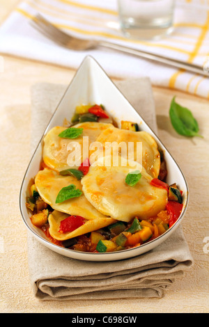 Tortellini of cheese and vegetables. Recipe available. Stock Photo