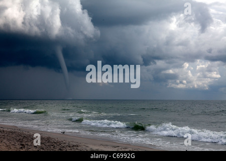 Tornado over Atlantic Ocean is approaching the coast at Carolina Beach, NC Stock Photo