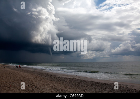 Tornado over Atlantic Ocean is approaching the coast at Carolina Beach, NC Stock Photo