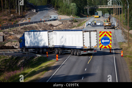 Roadworks on a highway traffic rerouted to temporary road , Finland