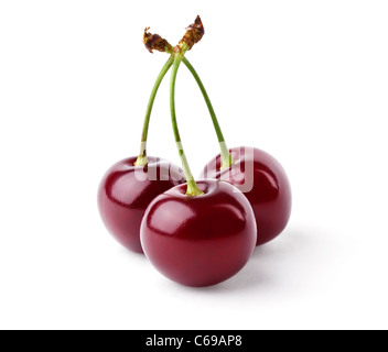 Three delicious cherries isolated on white background Stock Photo