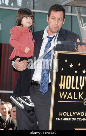 Adam Sandler, daughter Sunny Sandler at arrivals for Star on the Hollywood Walk of Fame Ceremony for Adam Sandler, Hollywood Boulevard, Los Angeles, CA February 1, 2011. Photo By: Elizabeth Goodenough/Everett Collection Stock Photo