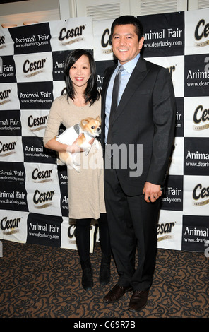 Judy Chung, CNBC anchor Carl Quintanilla in attendance for Puppy Love at Yappy Hour Humane Society of New York Benefit, Carlton Hotel, New York, NY February 11, 2011. Photo By: Desiree Navarro/Everett Collection Stock Photo