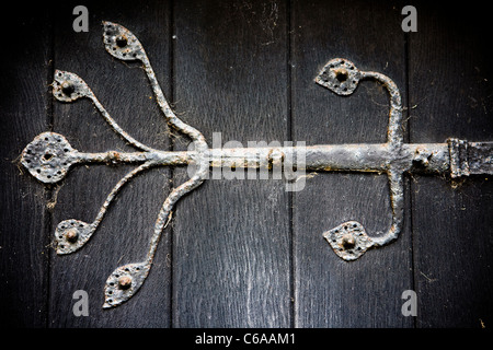 Ornate Georgian hinge on the main entrance door of St James' Church in Acton Trussell, Stafford Stock Photo