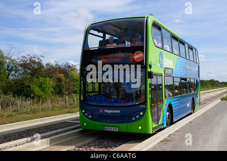 A Double Decker Bus on The Cambridge Guided Busway, Fen Drayton, Cambridgeshire, England, UK Stock Photo