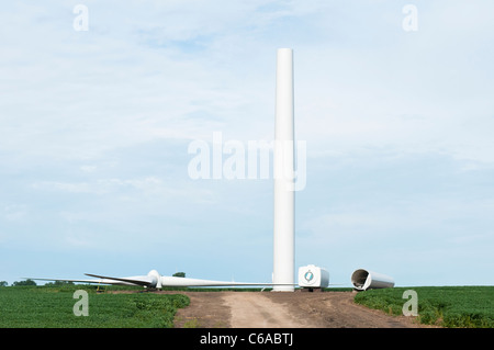 Components for a horizontal-axis wind turbine are ready for final assembly on a construction site near Lakefield, Minnesota. Stock Photo