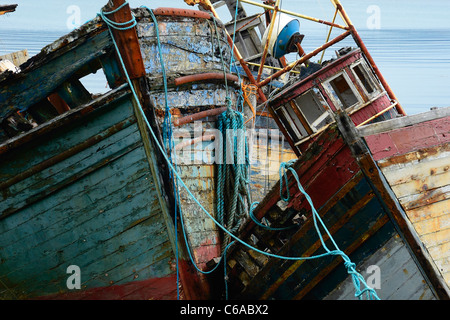 Beached and wrecked fishing boats on Isle of Mull, Scotland Stock Photo