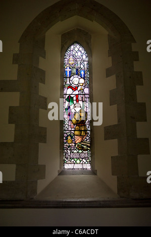 A stained glass window in St Teilo Church in Merthyr Mawr in Wales Stock Photo